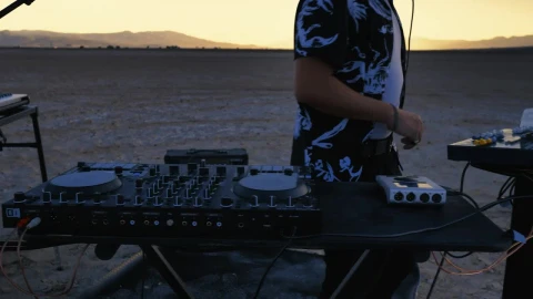Stock Video Dj Mixing Music In The Middle Of A Big Desert Live Wallpaper For PC - Free Live Wallpaper