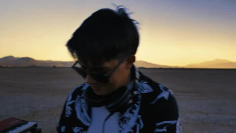 Stock Video Dj Mixing Electronic Music In A Lonely Desert Live Wallpaper For PC - Free Live Wallpaper