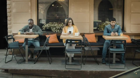 Stock Video Diverse Millenials Using Mobiles And Social Distancing In Cafe Live Wallpaper For PC - Free Live Wallpaper