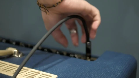 Stock Video Disconnecting An Instrument From An Amplifier Live Wallpaper For PC - Free Live Wallpaper