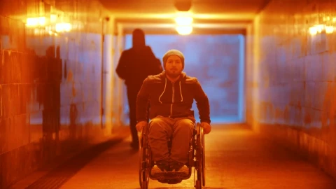 Stock Video Disabled Man In A Wheelchair Riding In The Underpass Live Wallpaper For PC - Free Live Wallpaper