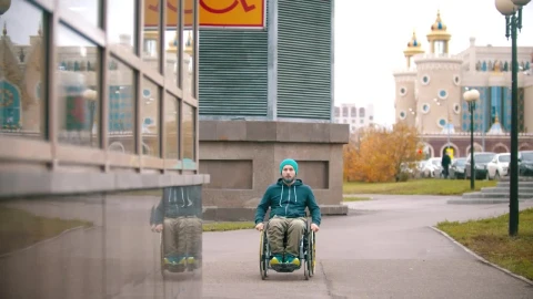 Stock Video Disabled Man In A Wheelchair And A Disabled Sign Live Wallpaper For PC - Free Live Wallpaper