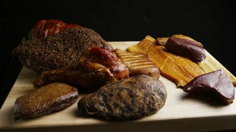 Stock Video Different Types Of Meat Rotating On A Wooden Board Live Wallpaper For PC - Free Live Wallpaper