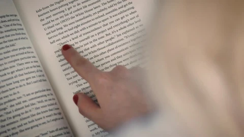 Stock Video Detailed View Of A Book Read By A Girl Live Wallpaper For PC - Free Live Wallpaper
