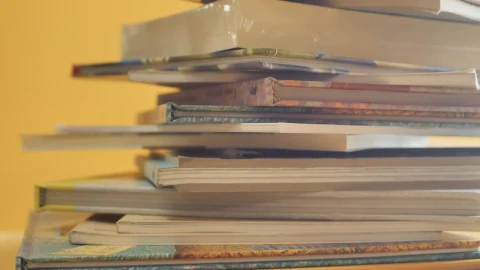 Stock Video Detailed View Of A Disarranged Tower Of Books Live Wallpaper For PC - Free Live Wallpaper