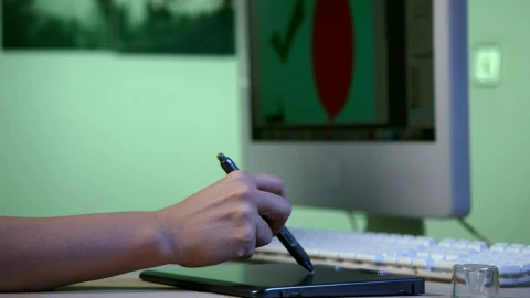 Stock Video Designer Using A Graphics Tablet Live Wallpaper For PC - Free Live Wallpaper