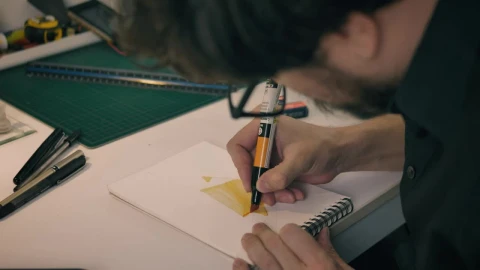 Stock Video Designer In His Studio Giving Color To His Strokes In Live Wallpaper For PC - Free Live Wallpaper