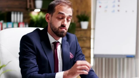 Stock Video Depressed Businessman Rubs Face And Looks At Report Live Wallpaper For PC - Free Live Wallpaper