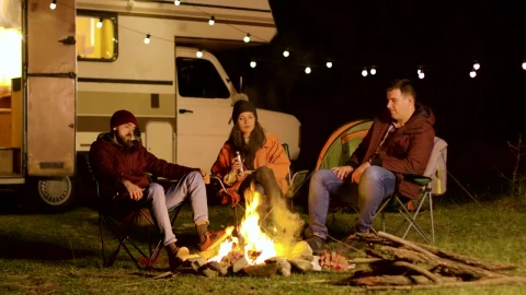 Stock Video Friends Enjoy A Quiet Night Around A Campfire Live Wallpaper For PC - Free Live Wallpaper