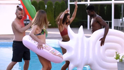 Stock Video Friends Dancing With Floats Beside A Swimming Pool Live Wallpaper For PC - Free Live Wallpaper