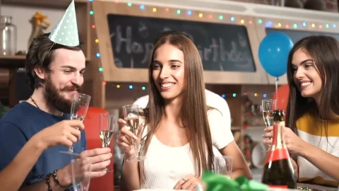 Stock Video Friends Celebrate With Champagne At Birthday Party Live Wallpaper For PC - Free Live Wallpaper