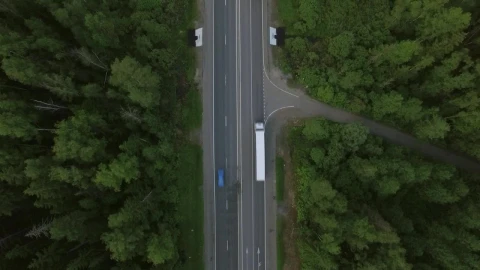 Stock Video Freight Trucks Heading Through A Forest Live Wallpaper For PC - Free Live Wallpaper