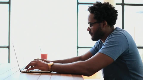 Stock Video Freelancer Typing On Their Laptop Live Wallpaper For PC - Free Live Wallpaper