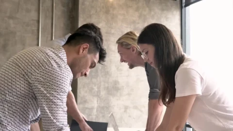 Stock Video Four Young People Talking During A Work Meeting Live Wallpaper For PC - Free Live Wallpaper