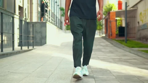 Stock Video Footsteps Of A Young Man Walking Down The Street Live Wallpaper For PC - Free Live Wallpaper