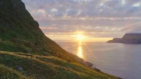Stock Video Flyover Lush Spring Hillside Toward Sunset On Sea Live Wallpaper For PC - Free Live Wallpaper