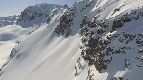 Stock Video Flying Through A Snowy Mountain With Rocks Live Wallpaper For PC - Free Live Wallpaper