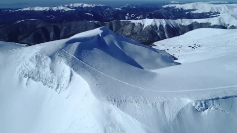 Stock Video Flying Slowly Over A Snowy Mountain Range Live Wallpaper For PC - Free Live Wallpaper