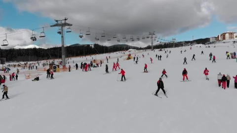 Stock Video Flying Over Skiers In The Snowy Mountain Live Wallpaper For PC - Free Live Wallpaper