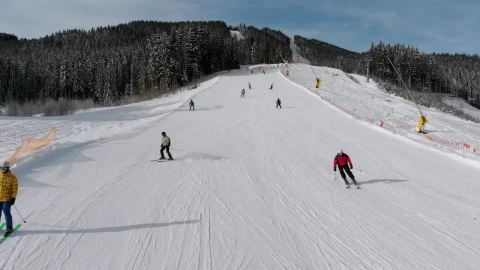 Stock Video Flying Over Skiers Going Down The Snowy Moountain Live Wallpaper For PC - Free Live Wallpaper