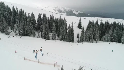 Stock Video Flying Over Mountains Slope With Skiers Live Wallpaper For PC - Free Live Wallpaper