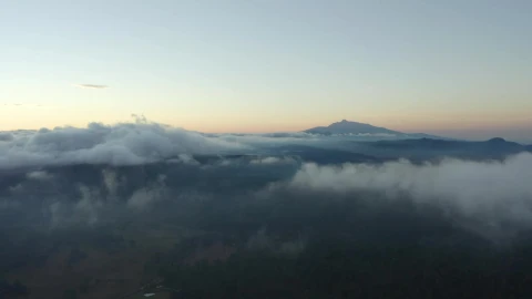 Stock Video Flying Over A Mountainous Landscape Covered With Clouds Live Wallpaper For PC - Free Live Wallpaper