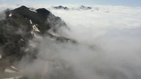 Stock Video Flying Over A Cloudy Mountain Range Live Wallpaper For PC - Free Live Wallpaper