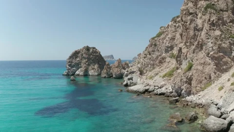 Stock Video Flying On The Rocky Shore Of A Turquoise Blue Sea Live Wallpaper For PC - Free Live Wallpaper
