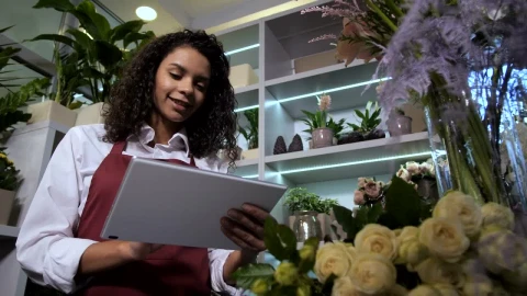 Stock Video Florist Smiling As She Works In Her Store Live Wallpaper For PC - Free Live Wallpaper