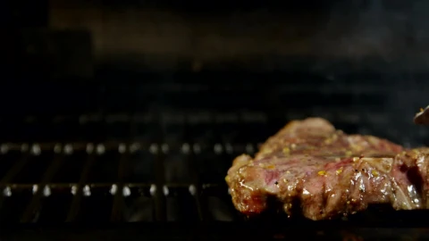 Stock Video Flipping A Flame Grilled Steak Live Wallpaper For PC - Free Live Wallpaper