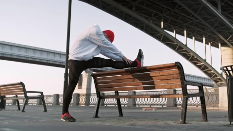 Stock Video Fitness Man Stretching His Leg Before Training Live Wallpaper For PC - Free Live Wallpaper