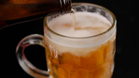 Stock Video Filling A Mug With Beer On A Dark Background Live Wallpaper For PC - Free Live Wallpaper