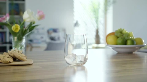 Stock Video Filling A Glass With Sparkling Water In The Kitchen Table Live Wallpaper For PC - Free Live Wallpaper