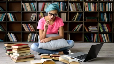 Stock Video Female Student In The Library Live Wallpaper For PC - Free Live Wallpaper