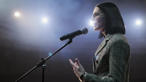 Stock Video Female Speaker Giving A Talk On Stage Live Wallpaper For PC - Free Live Wallpaper