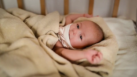Stock Video Female Newborn Baby Lying In Her Crib Live Wallpaper For PC - Free Live Wallpaper