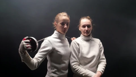 Stock Video Female Fencers Head On With A Dark Background Live Wallpaper For PC - Free Live Wallpaper