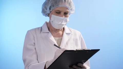 Stock Video Female Doctor Writes In Her Notebook Live Wallpaper For PC - Free Live Wallpaper