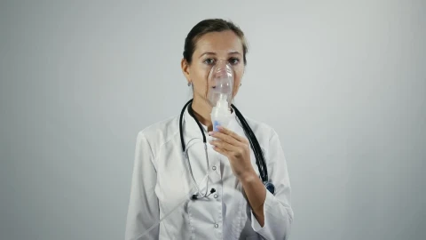 Stock Video Female Doctor Using Inhalator Device Live Wallpaper For PC - Free Live Wallpaper