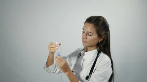 Stock Video Female Doctor Testing An Inhaler Live Wallpaper For PC - Free Live Wallpaper