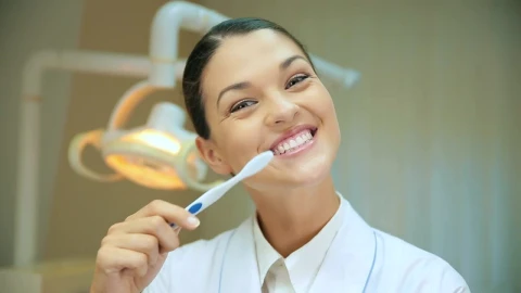 Stock Video Female Dentist Teaching How To Brush Teeth Live Wallpaper For PC - Free Live Wallpaper