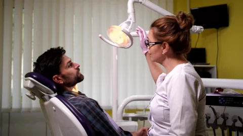 Stock Video Female Dentist Checking Her Patient Live Wallpaper For PC - Free Live Wallpaper