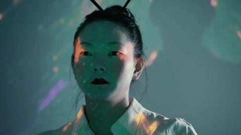 Stock Video Female Cyborg Raising Hand And Looking At The Camera Live Wallpaper For PC - Free Live Wallpaper