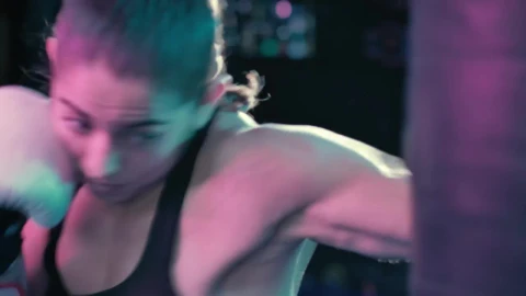 Stock Video Female Boxer Training With A Punching Bag Live Wallpaper For PC - Free Live Wallpaper