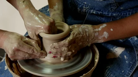 Stock Video Female And Male Hands Working Together On Raw Clay Live Wallpaper For PC - Free Live Wallpaper