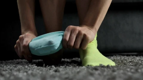 Stock Video Feet Of A Woman Putting On Different Colored Socks Live Wallpaper For PC - Free Live Wallpaper