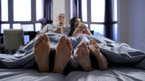 Stock Video Feet Of A Man And A Woman Lying On A Live Wallpaper For PC - Free Live Wallpaper
