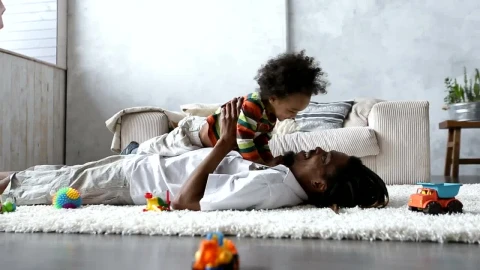 Stock Video Father Playing On The Carpet With His Little Son Live Wallpaper For PC - Free Live Wallpaper