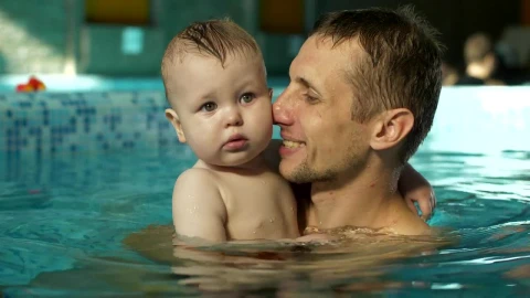 Stock Video Father Hugging His Son In The Pool Live Wallpaper For PC - Free Live Wallpaper