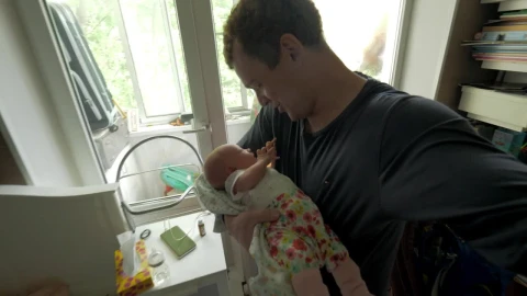 Stock Video Father Caring For His Newborn Baby Live Wallpaper For PC - Free Live Wallpaper